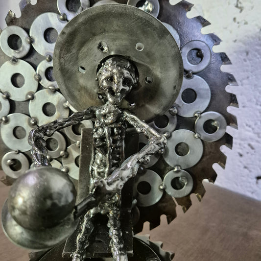 The Eternal Forge, Architect of Life: Sculpture and Reflection